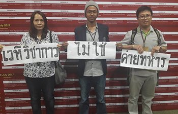 แอมเนสตี้ ร้องไทยยุติดำเนินคดีในข้อหาชูป้าย #เวทีวิชาการไม่ใช่ค่ายทหาร ชี้ขัดต่อเสรีภาพในการแสดงออก